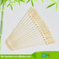 Top quality natural eco-friendly wooden cooking stick with bamboo handle for BBQ with logo